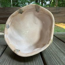 Load image into Gallery viewer, Pottery bowl laying on its side showing off the inside view.