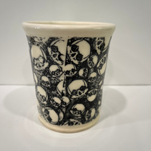 Load image into Gallery viewer, Ceramic cup with black and white skull pattern on a white background