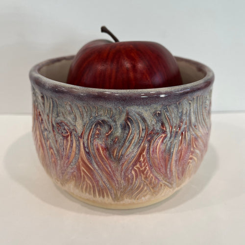 Carved pottery bowl