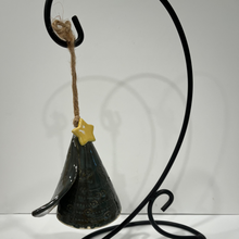 Load image into Gallery viewer, Decorative green cone with a yellow star on a black metal stand against a white background
