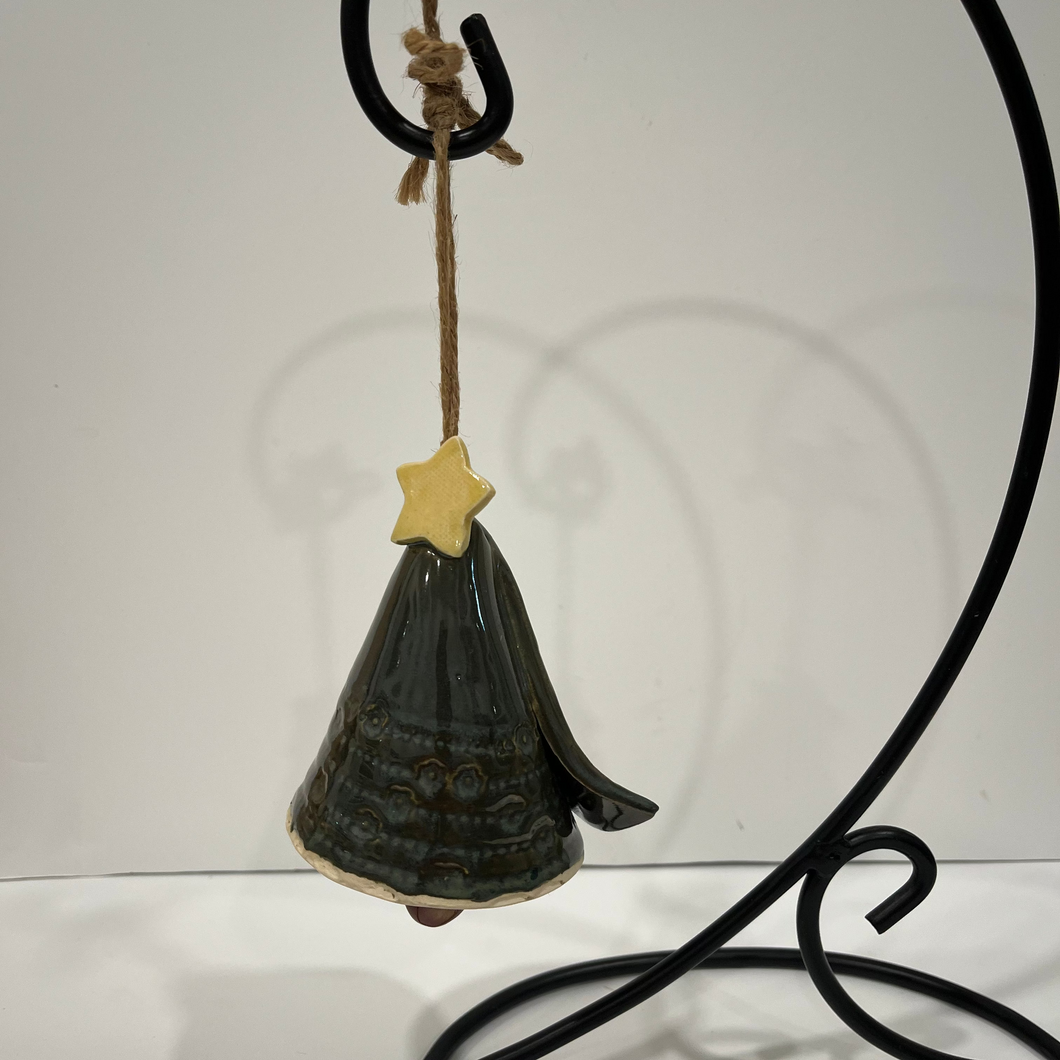 Decorative bell with a star on a white background