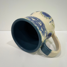 Load image into Gallery viewer, Ceramic mug with blue and white design on a white background

