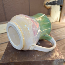 Load image into Gallery viewer, Colorful ceramic mug on a metal surface with a neutral background
