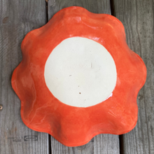 Load image into Gallery viewer, Orange and white ceramic plate with scalloped edge on a wooden surface
