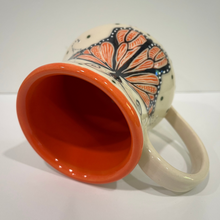 Load image into Gallery viewer, Ceramic mug with butterfly design on a white background
