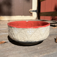 Load image into Gallery viewer, Ceramic bowl with red interior on a wooden surface
