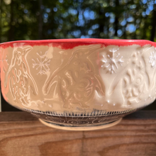 Load image into Gallery viewer, Ceramic bowl with embossed design on a wooden surface with a blurred natural background
