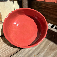 Load image into Gallery viewer, Red interior of penguin pottery bowl.
