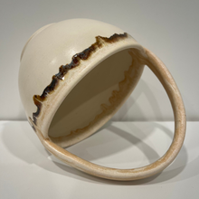 Load image into Gallery viewer, White pottery basket laying on its side
