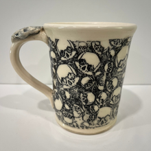 Load image into Gallery viewer, Ceramic mug with black and white pattern on a white background
