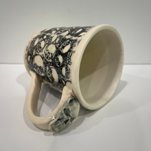 Load image into Gallery viewer, Skull Pottery Mug 4 with view of skull on handle.
